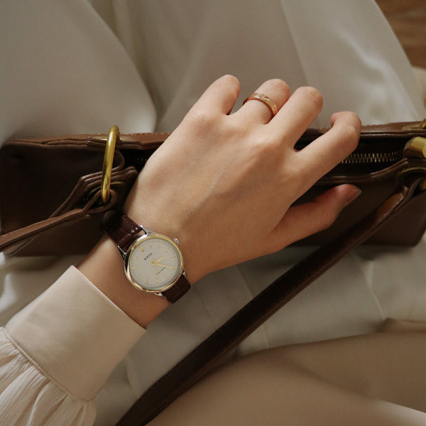 Ženski sat - okruglog oblika