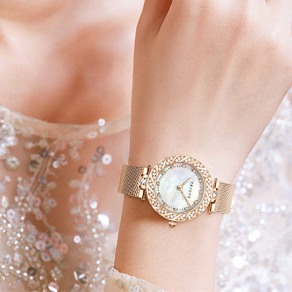 Kaasaegne mehaaniline metallist luku ja dekoratiivkividega käekell