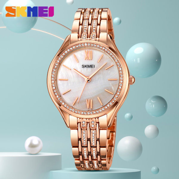 Moderan ženski sat sa metalnim lancem - zlatne i srebrne boje