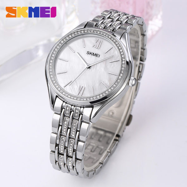 Moderan ženski sat sa metalnim lancem - zlatne i srebrne boje