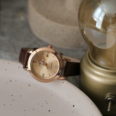 Ceas cu forma rotunda si curea din piele ecologica