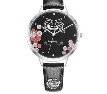 Dekoratiivsete elementide ja nahkrihmaga naiste käekell