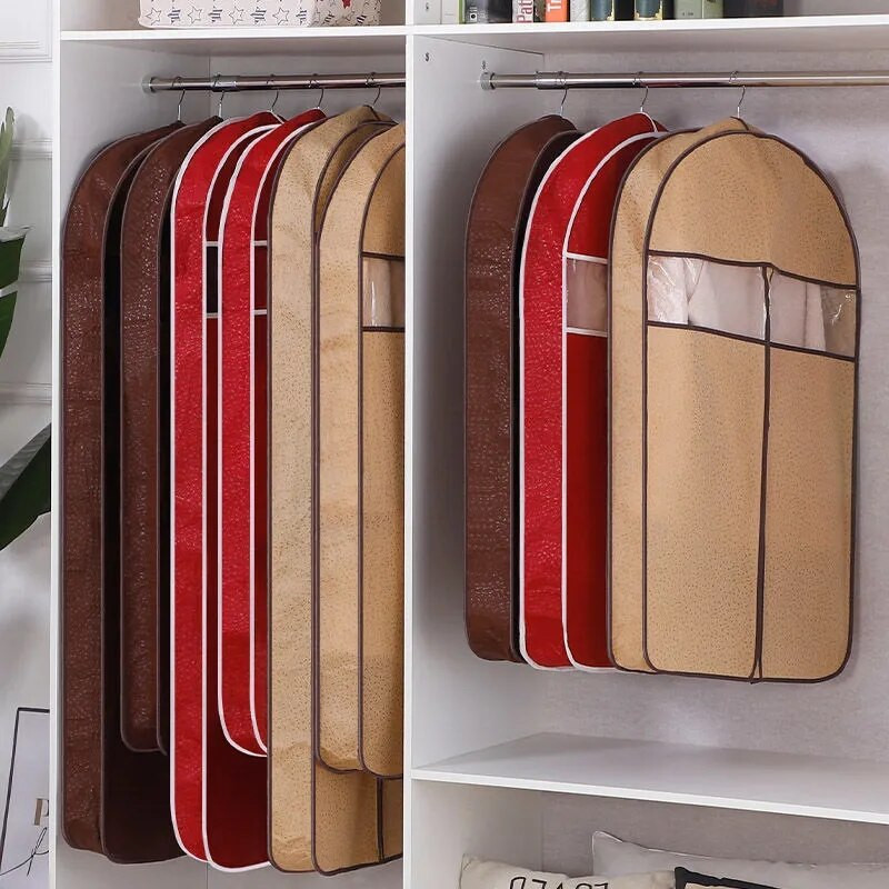 Τρισδιάστατο κάλυμμα ενδυμάτων Κρεμαστή τσέπη Οικιακό προστατευτικό παλτό Μη υφαντό ρούχο Κάλυμμα σκόνης Διαφανές με φερμουάρ