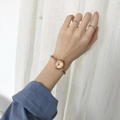 Terasest ümara kujuga naiste käekell