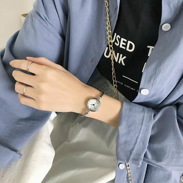 Terasest ümara kujuga naiste käekell