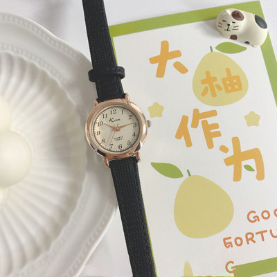 Stiilne ümara kujuga ja ökonahast rihmaga naiste käekell