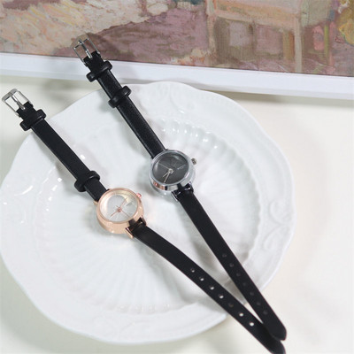 Ümara kuju ja nahkrihmaga puhas naistekell