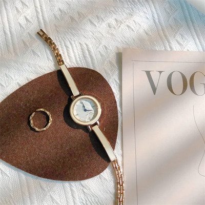 Elegantni ženski sat u zlatnoj i srebrnoj boji