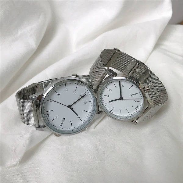 Γυναικείο μοντέρνο ρολόι με μεταλλικό λουράκι