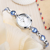 Moodne naiste käekell kivide kaunistusega