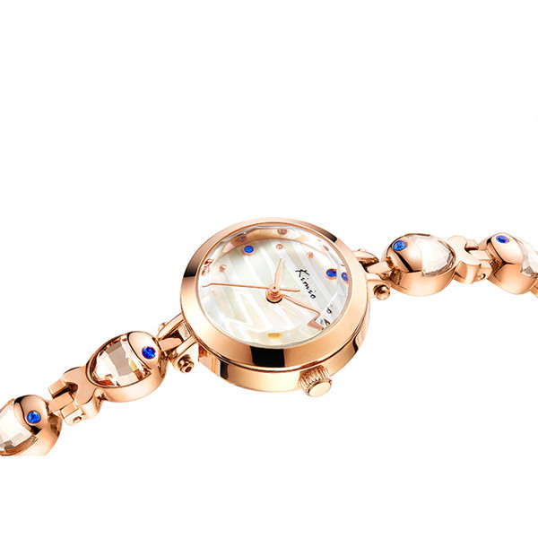 Moodne naiste käekell kivide kaunistusega