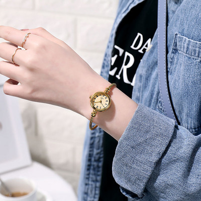 Moteriškas laikrodis – apyrankės tipo