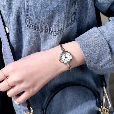 Moteriškas laikrodis – apyrankės tipo