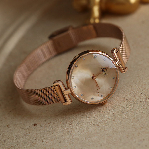 Ženski elegantni sat s kamenčićima