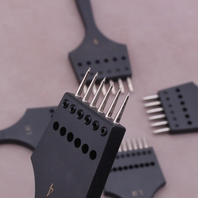 Eemaldatav ümmarguse auguga nahast stantsimistööriist Terav pea, vahetatav torkimisraud Professionaalne stantsimistööriist Nahast käsitööna