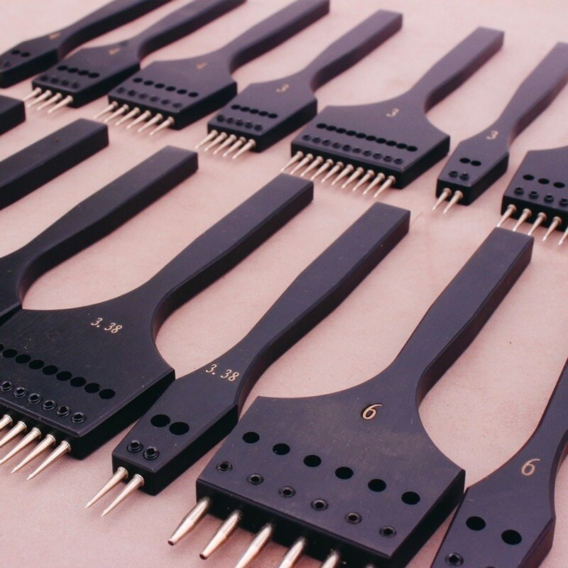 Eemaldatav ümmarguse auguga nahast stantsimistööriist Terav pea, vahetatav torkimisraud Professionaalne stantsimistööriist Nahast käsitööna