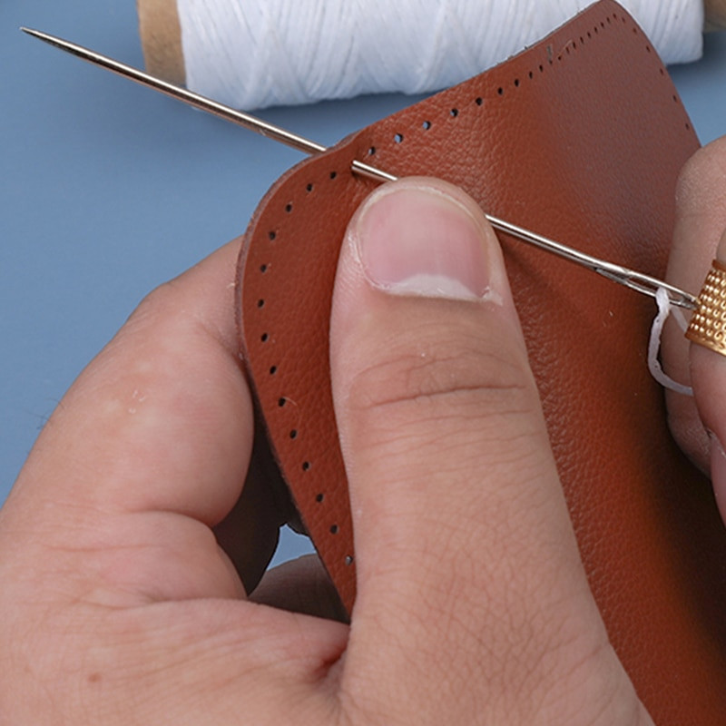 9 tk nahaõmbluskomplekt koos mitmevärvilise vahatatud niidiga kuldse sõrmkübara ja nahast õmblusnõeltega nahast käsitöö tegemiseks