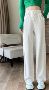 Laiade säärede ja paeltega naiste spordipüksid