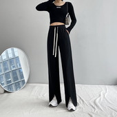 Pantaloni eleganti de dama cu talie inalta si crapaturi pe picioare