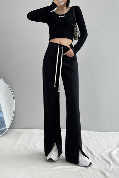 Pantaloni eleganti de dama cu talie inalta si crapaturi pe picioare