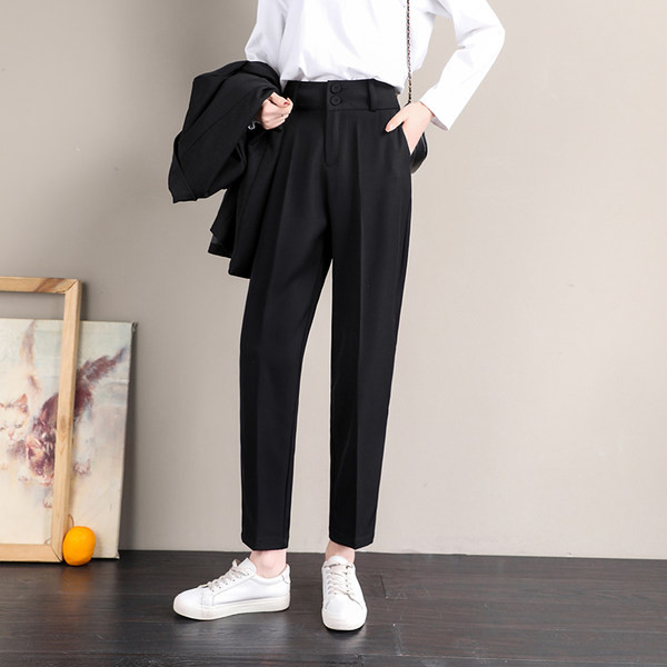 Moodsad musta värvi kõrge pihaga naiste püksid