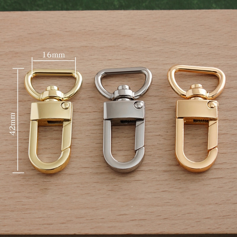 2 komada metalnih karabina, kopči za okidanje, kopče za kožni remen/ remen, privjesak za ključeve, remen, kuke za povodac za kućne ljubimce