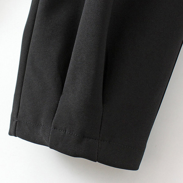 Sportlikud vabaaja püksid kummiku ja taskuga