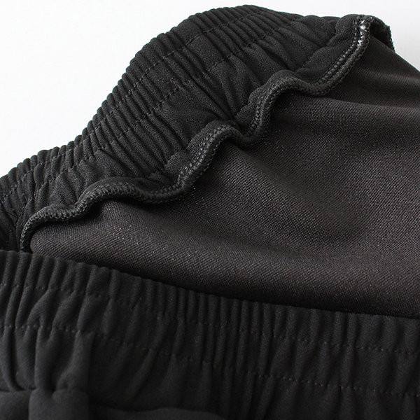 Sportlikud vabaaja püksid kummiku ja taskuga