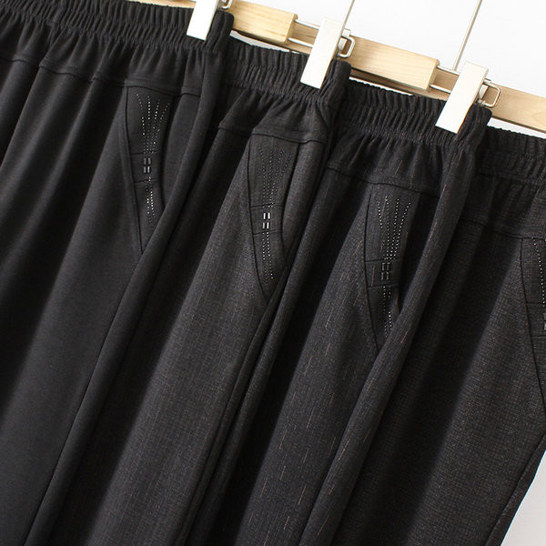 Naiste pükste lai mudel kõrge vöökoha ja taskuga