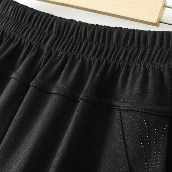 Naiste pükste lai mudel kõrge vöökoha ja taskuga