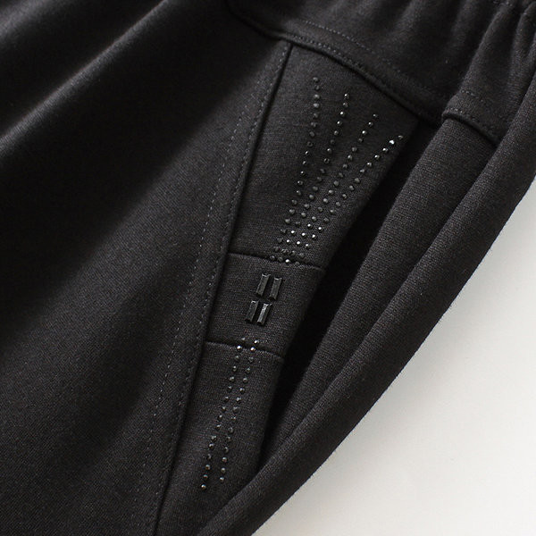 Naiste pükste lai mudel kõrge vöökoha ja taskuga