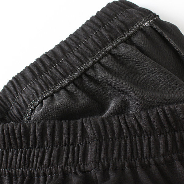 Naiste pükste lai mudel kõrge vöökoha ja taskuga