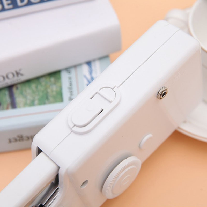 Käeshoitav kaasaskantav õmblusmasin multifunktsionaalne mini kodumajapidamises kasutatav elektriline õmblusmasin