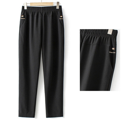 Ravni model ženskih hlača s elastičnim strukom