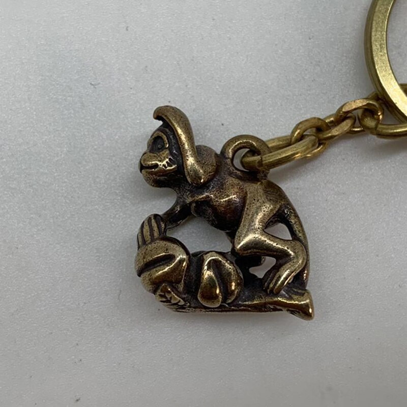 DIY nahast nikerdatud nahast kunst võtmehoidja tarvikud Puhtad vasest ripatsikomponendid, retrostiilis 12 sümboolset looma