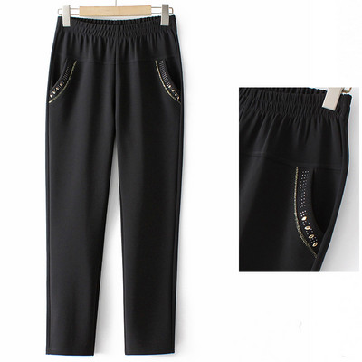 Naiste fliispüksid tasku ja trükiga