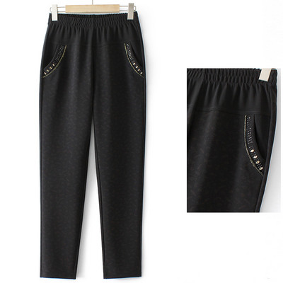 Naiste fliispüksid tasku ja trükiga