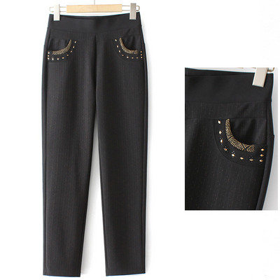 Ženske hlače s džepom i metalnim elementima