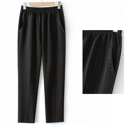 Naiste vabaaja püksid kividega ja kummiga