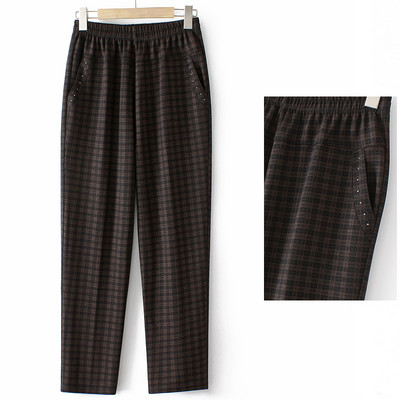 Naiste vabaaja püksid kividega ja kummiga