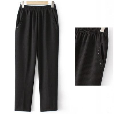 Naiste vabaaja püksid kividega ja kummiga