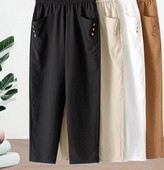 Nyári női nadrág gumírozott derékkal és gombokkal