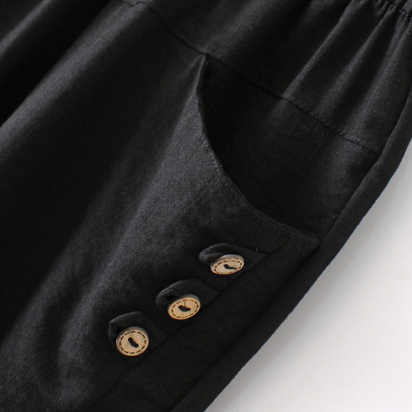 Nyári női nadrág gumírozott derékkal és gombokkal