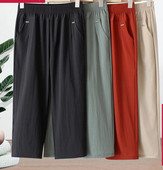 Naiste vabaajapükste lai mudel kõrge vöökoha ja taskuga