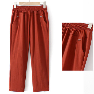 Naiste vabaajapükste lai mudel kõrge vöökoha ja taskuga