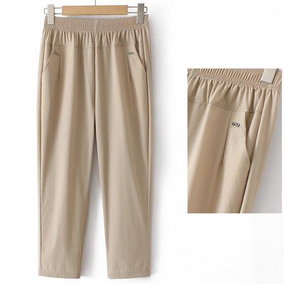 Naiste vabaajapükste lai mudel kõrge vöökoha ja taskuga