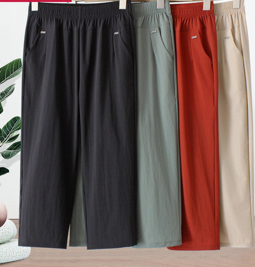 Naiste vabaajapükste lai mudel kõrge vöökoha ja taskuga