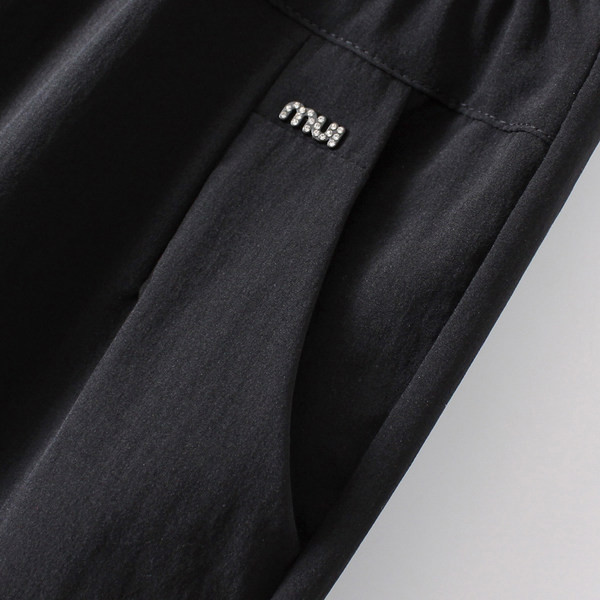 Naiste vabaajapükste lai mudel kõrge vöökoha ja taskuga