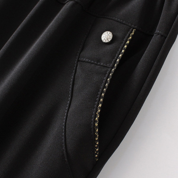 Naiste elastse vöökoha ja sirge säärega püksid