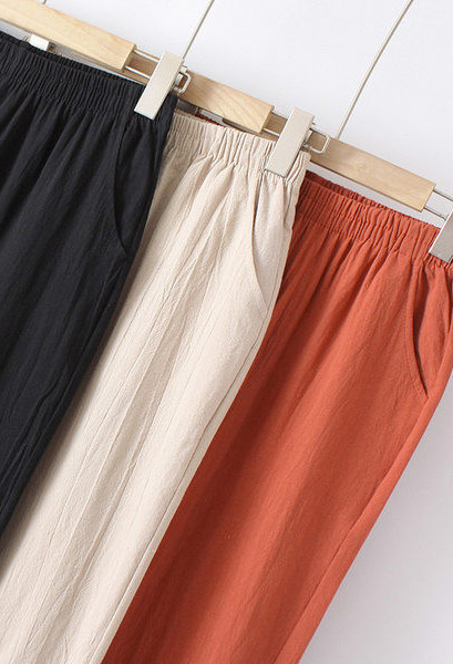 Ležerne ženske hlače - s vezom